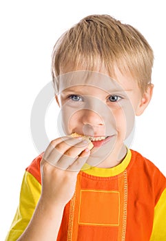 Boy eating cookie