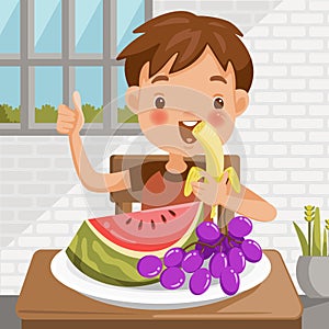 Boy eating fruit