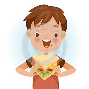 Boy eating sandwich