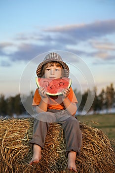 Boy eating watermelon