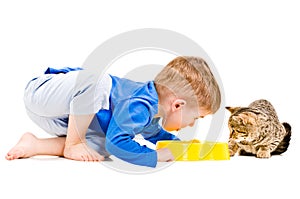 Boy eats a bowl of cat