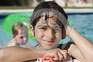 Boy At Edge Of Swimming Pool