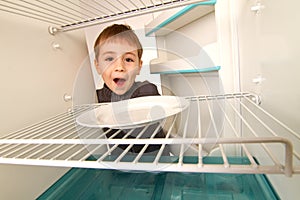 Boy and Empty Refrigerator