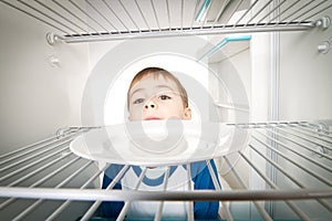 Boy and Empty Refrigerator