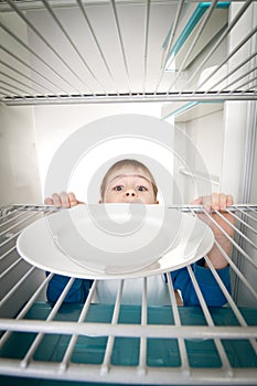 Boy and Empty Refrigerator