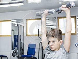 Boy engaged in the gym hall