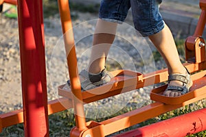Boy is engaged on a simulator on the street