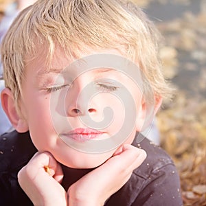 Boy Enjoying Autumn Fun