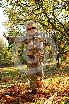 Boy enjoying fall