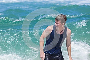 Boy Exits Ocean Beach photo