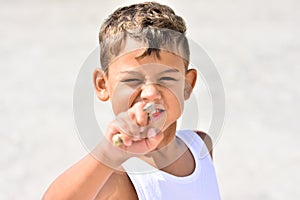 Boy exploring beach