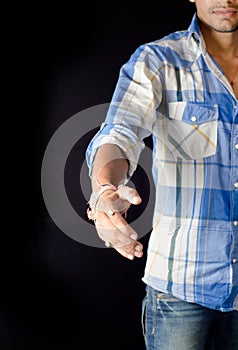 Boy extending hand shake indian