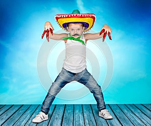 Boy with a fake mustache and in the Mexican sombrero.