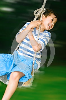 Boy on fast swing