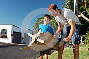 Boy father toy aeroplane