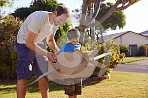 Boy father toy aeroplane