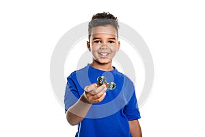 Boy Fidget Spinner Held in Foreground