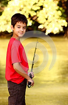 A boy with fishing rod