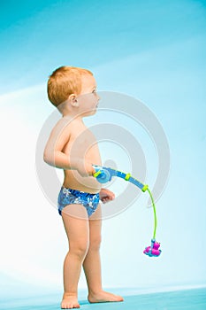 Boy with fishing tackle