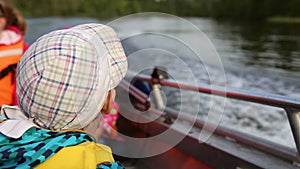 The boy floating on a boat