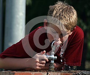Boy At Fountain