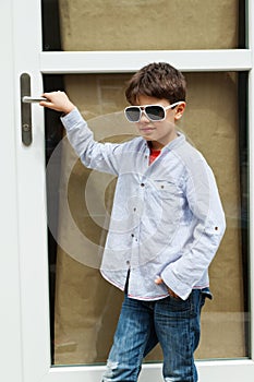 Boy in front of the door