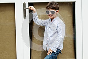 Boy in front of the door