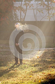 Boy on frosty morning in park