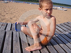 Boy with game console