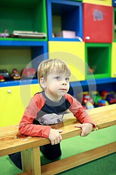 Boy in game room