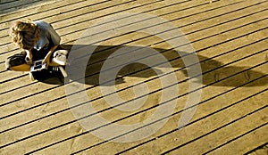 Boy gamer on decking