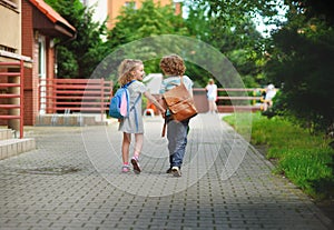 Boy and gerlie go to school having joined hands.