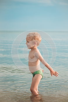 Boy getting ready to jump to dive deep