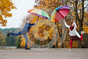 Boy and girl in autumn park