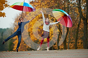 Boy and girl in autumn park