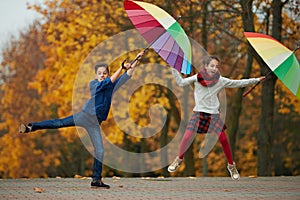 Boy and girl in autumn park