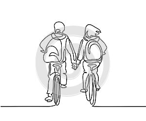 Boy and girl bicycling to school photo