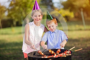 Boy and girl celebrating birthday