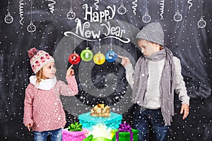 Boy and girl celebrating New Year