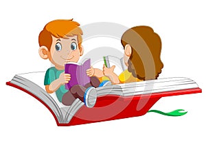 Boy and girl child flying on a big open book