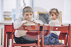 Boy, girl children in the school has a happy, curious, smart