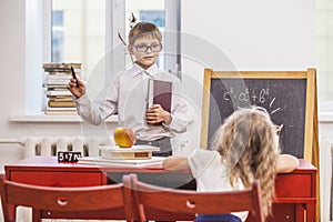 Boy, girl children in the school has a happy, curious, smart