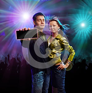 Boy and girl in a club