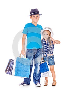 Boy and girl with customer paper bags
