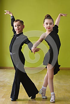 Boy and girl dancing ballroom dance photo
