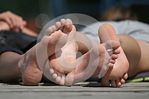 Boy and girl foots photo