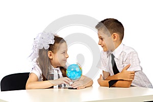 Boy and girl with globe