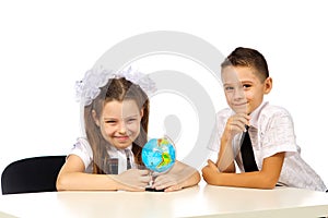 Boy and girl with globe