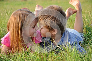 Boy and girl on grass