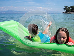 Boy and girl at the Greek seaside